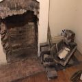 Fireplace brick arch in need of repair.